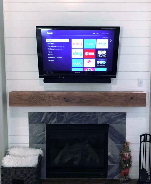 Hiding tv wires over fireplace