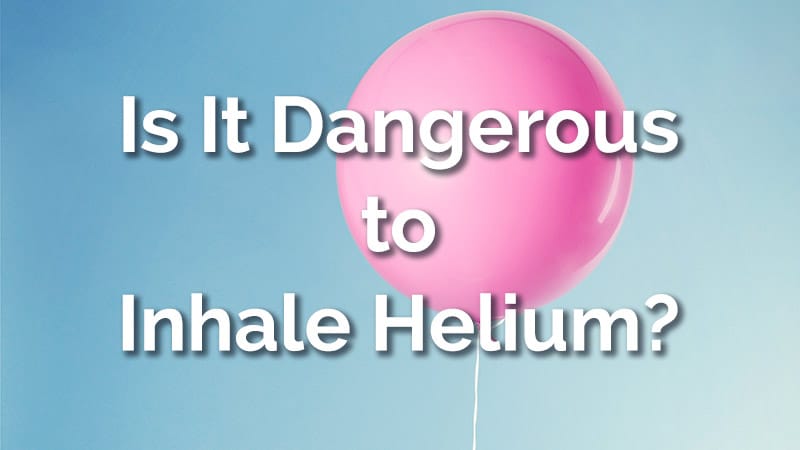 A pink inflated balloon with helium