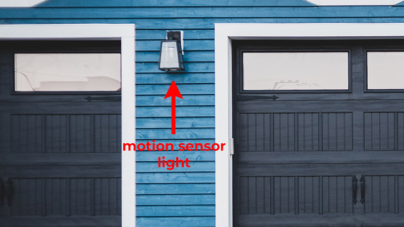 Motion sensor light next to garage window