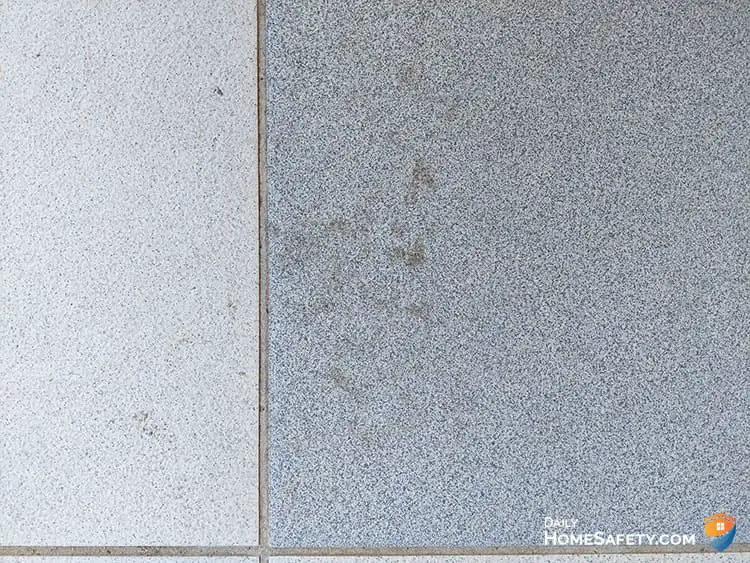 A muddy footprint on tile floor